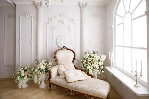 Light couch in a classic interior Stock Photos