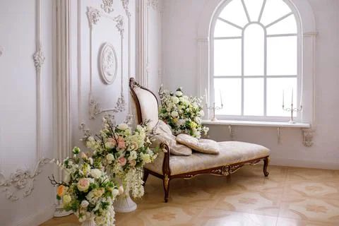 Light couch in a classic interior Stock Photos