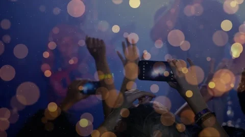 Light cue starting crowd holding phones, moving wrists, clapping, capturing show Stock Footage 334179034