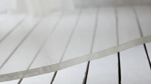 Light curtains in the wind corridor slow motion background Stock-Footage 73683346