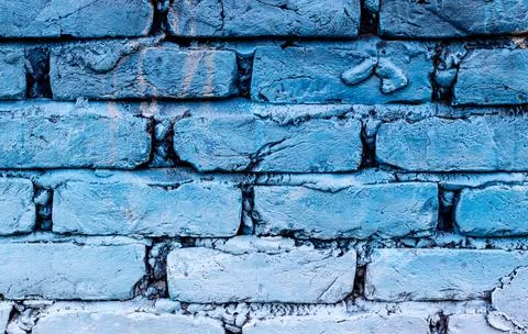 Light cyan gradient colored brick structural wall for texture and pattern bac Stock Photos