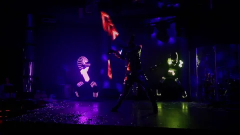 Light dance show performance on stage in club. Mirror and glowing clothes 스톡 동영상 164214268