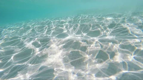 Light dancing on sandy bottom Stock Footage 67530215