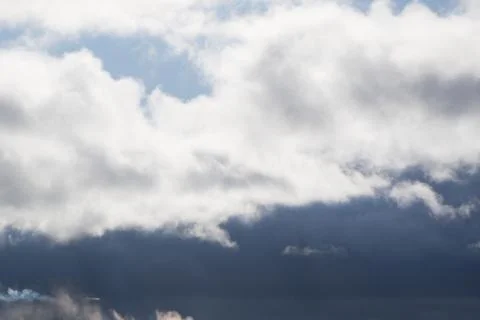 Light in the Dark and Dramatic Storm Clouds . Stock Photos
