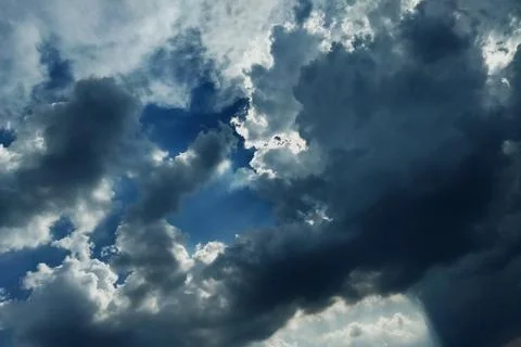 Light in the Dark and Dramatic Storm Clouds Stock Photos