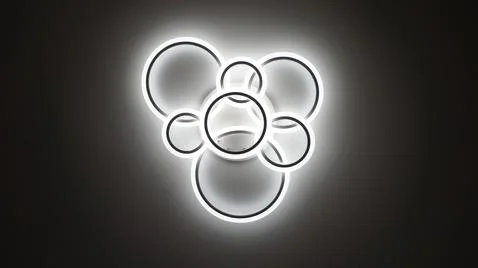 Light on a dark background, bright light, dark background. Stock Photos