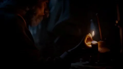 Light in the Dark: Lighting a Candle in the Night Forest Vídeo Stock 249165684