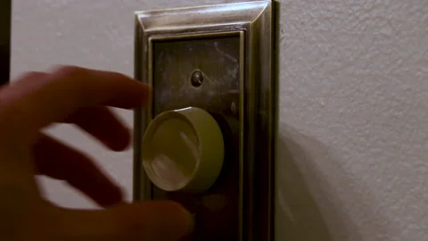 Light Dimmer Turning Off the Lights Stock Footage 153490692