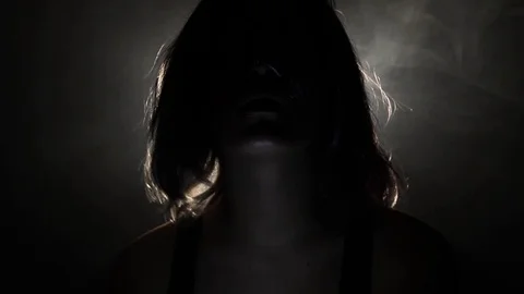 Light disappears from creepy figure Stock Footage 121435540