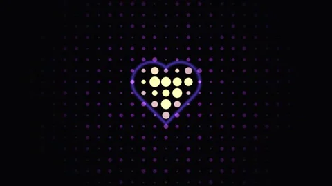 Light display in heart shape with dotted background at Stock Footage 338292039