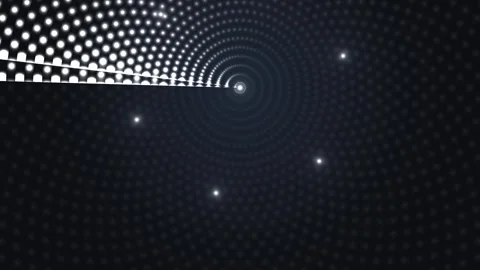 Light dots create a spiral pattern on a dark background Stock Footage 339327508