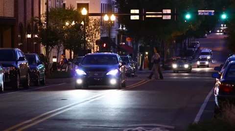 Light Downtown Traffic at Night Stock Footage 1094258