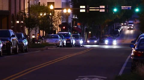 Light Downtown Traffic at Night - Speed Increased Stock Footage 1094269