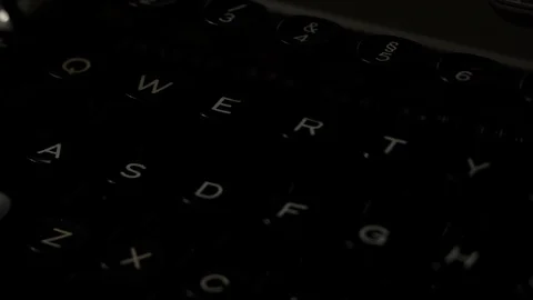 Light effect across old vintage retro typewriter QWERTY keyboard Stock Footage 125145810