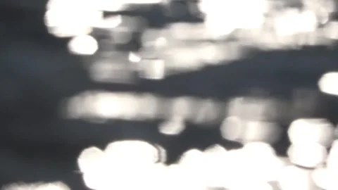 Light effects of flowing water from the stream Video stock 262439146