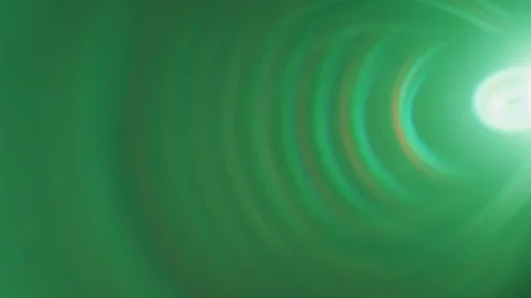 Light effects produced with a spot, light flare in different colors Video stock 102386347