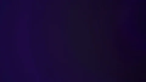 Light effects produced with a spot, light flare in different colors Video stock 102386491