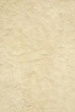 Light empty surface of grunge concrete wall covered with plaster and paint. Fotos de archivo