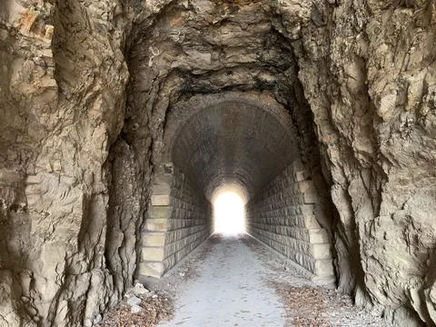 Light at the end of the Train Tunnel Stock Photos