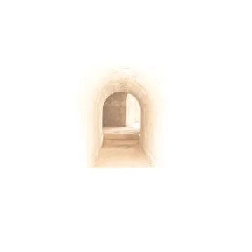 A light in the end of a tunnel. Medieval gate in the old castle. Stock Photos