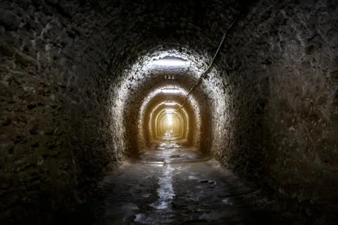 A light in the end of a tunnel. Stock Photos