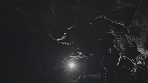 Light at the end of the underground stone tunnel Stock Footage 106501091