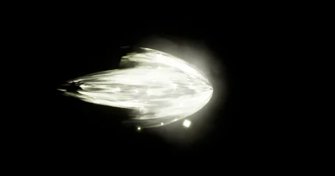 Light energy projectile effect on black background Stock Footage 317533272