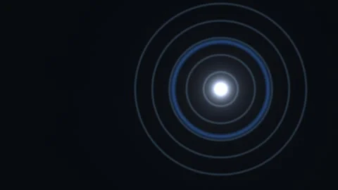 Light expands in circles on a dark background Video stock 338237022
