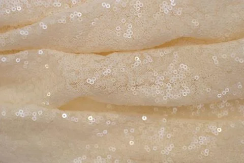 Light fabric with shiny sequins Stock Photos