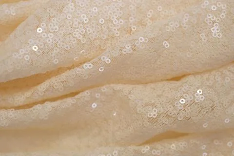 Light fabric with shiny sequins Stock Photos