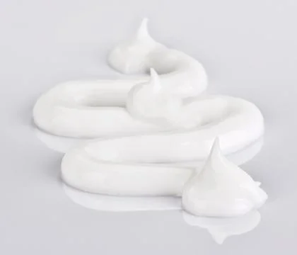 Light face cream samples on white Stock Photos