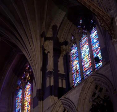 Light falling in gothic cathedral Stock Photos