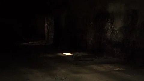 Light falling through the window of an old underground ancient building Video stock 329393058