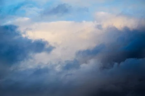 Light falls on the clouds from above Stock Photos