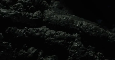 Light falls on a detailed meteorite Stock Footage 190834884