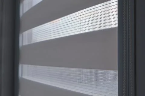 Light Filtering Through Window Shades in a Home Setting During the Day Stock Photos