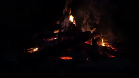 The light from the fire and the flames in the night sky. the colors of the fire Stock Footage 172364073