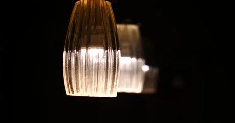 Light fixture close-up in a row isolated on black lighting room Stock Footage 213129067