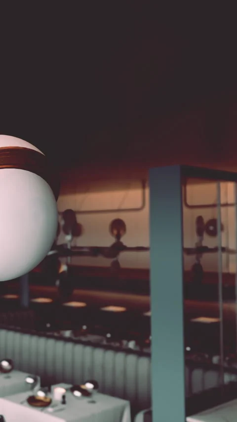 Light fixture hangs above a modern interior in a cafe setting Vídeo Stock 338381060