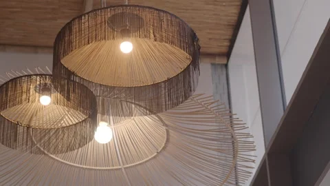 Light fixtures in a modern cafe setting showcase design Stock Footage 332452253