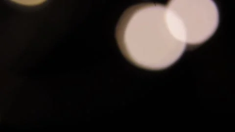 The light of the flickering lights moves slowly upwards in a cluster. Видео 317488983