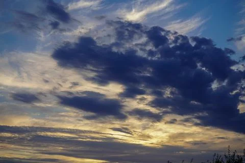Light fluffy clouds at dusk 写真素材