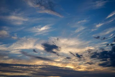 Light fluffy clouds at dusk 写真素材