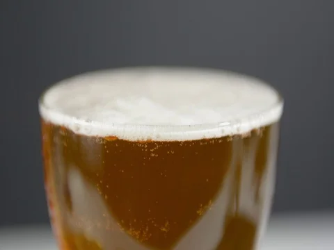 Light foam craft beer. Bubbles rise Stock-Footage 121251555