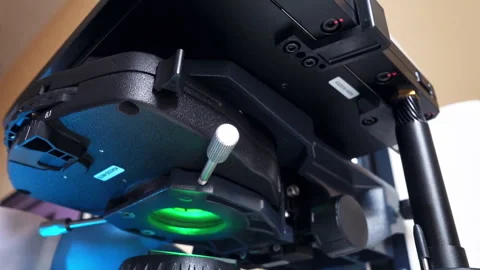 Light focusing unit in an optical laboratory microscope. Stock Footage 241076624