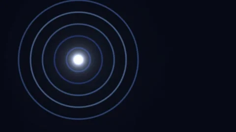 Light forms circular patterns in dark background Stock Footage 338389328