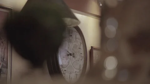 Light Game in the Clock Window 4K Stock Footage 76513670