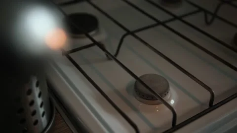 Light The Gas Stove Manually With A Slow Motion. A burning match. Soft selective Stock Footage 161328401
