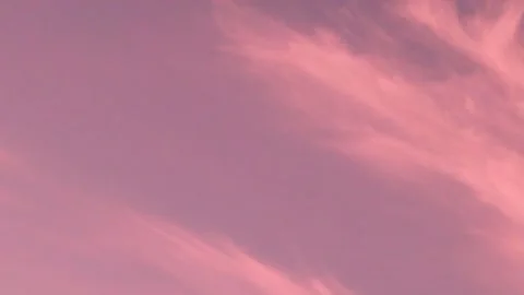 Light Gentle Clouds in Pink Lilac Blue Sky at Sunrise Time Lapse. Beautiful Clea Stock Footage 270075411