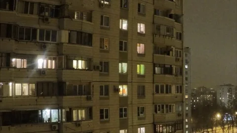 Light goes out and lights up in apartment building timelapse Stock Footage 79814674